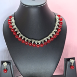 maroon bead with antique charms